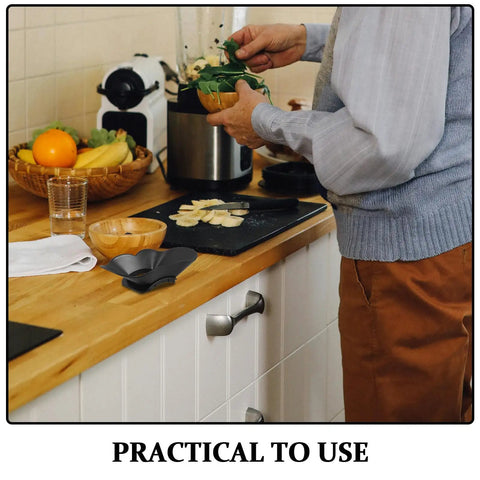 Juicer Spout Splash Guard Replacement Part FS301 FS300 on kitchen counter next to cutting board and blender