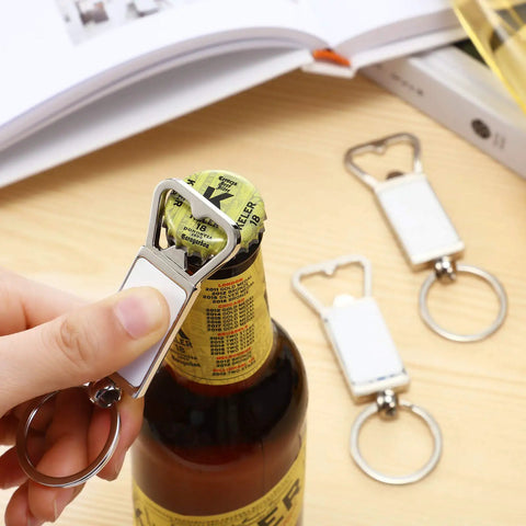 20 Pack Sublimation Keychain Blanks With Bottle Opener in use on a bottle cap, aluminum metal key rings visible