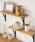 12 Pack Matte Black Heavy Duty Shelf Brackets With Screws Built Like A Tank For Rustic Home And Garage Shelving holding wooden shelves with dishes.