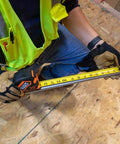Heavy Duty Tape Measure With 30 Foot Double Hook, Double Sided Nylon Reinforced Blade, 13 Foot Standout in use by worker