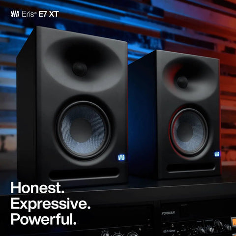 Eris E7 XT 2 Way Active Studio Monitor With EBM Waveguide on a sound desk in home studio setup