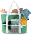 40L Mesh Beach Tote Bag With Sandproof Quick Dry Mesh And Waterproof Pocket filled with beach essentials in green and white