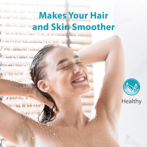 Woman enjoying shower benefits from Whole House Scale Inhibitor Inline Water System with Food Grade Polyphosphate to Prevent Scale Build Up