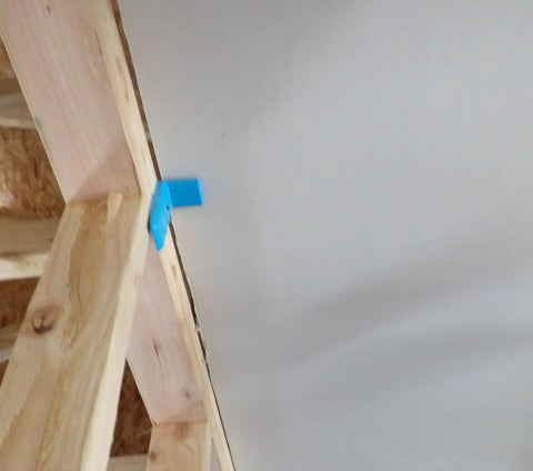 Drywall Buddy Tool Set Of 2 for easy and safe wall and ceiling drywall fitting and support, installed on ceiling frame.