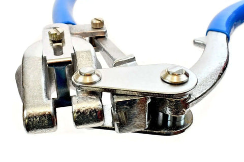 Close-up of hand held hole punch kit for sheet metal and plastic 7 hole sizes with over 1 ton punch power, no drill required