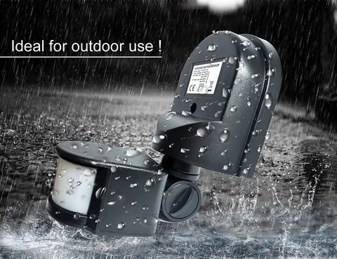 Outdoor Motion Sensor Light Switch With Dusk To Dawn, showcased in rainy conditions to highlight waterproof capability