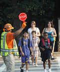 Crossing guard holding Stop And Go Traffic Sign With Handle For Kids Double Sided Red Light Green Light Crossing Guard Sign Waterproof