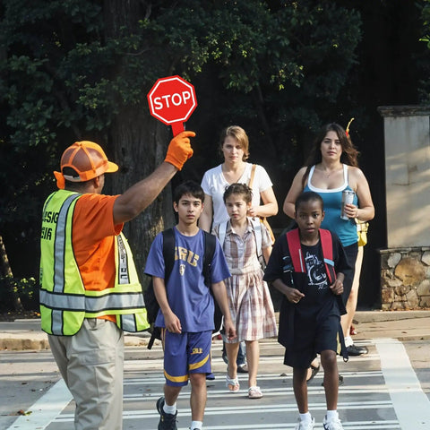 Crossing guard holding Stop And Go Traffic Sign With Handle For Kids Double Sided Red Light Green Light Crossing Guard Sign Waterproof