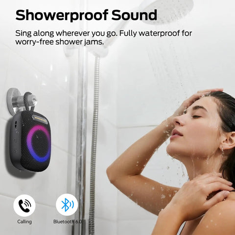 Outdoor Bluetooth Speaker with IPX7 Waterproof Rugged Build installed in shower, compact design with RGB lights, 10-hour playtime