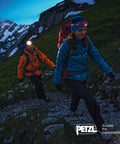Hikers wearing Pixa 3R Rechargeable Headlamp With Adjustable Headband Hands Free Night Light For Hiking Camping Running And Work Tasks Long Battery Life Bright LED Beam Durable Comfortable Fit E78CHR Ready, trekking in mountains.