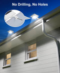 Four Pack White Solar Powered Gutter Lights Outdoor Decorative Waterproof 12 LEDs Yard Lamps illuminating a house gutter