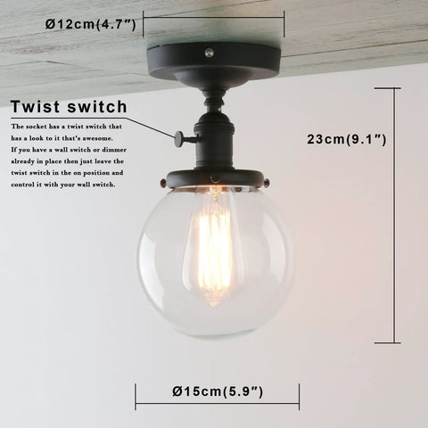 Slick Modern Semi Flush Mount Ceiling Light with handblown clear glass globe shade, black finish, E26 LED compatible, twist switch detail
