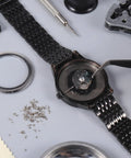 Straight Up Premium Watch Battery Clamp Screws Assortment Kit Hella Sturdy Stainless Steel Hardware No Hassle Essential For Precision Watchmaker Repairs And Dial Fixes, watch being repaired with tools.