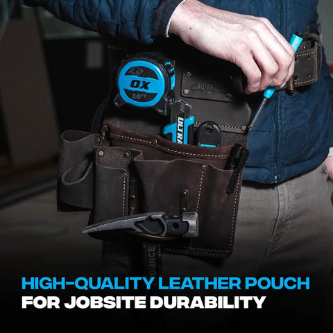 Person using Oil Tanned Leather Drywall Tool Pouch With Hammer Loop And Double Stitching, 12 Pockets For Hammers, Screwdrivers, Saws And More