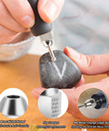 Hand using 15 Piece Drill Chuck Collet Set for Rotary Tools With No Fuss Quick Change Brass Nut 0.5mm to 3.2mm for engraving a stone