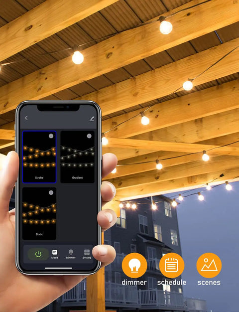 Person holding app showing settings for Lit Dimmer Enabled Outdoor String Lights 100Ft LED Patio With App Control.