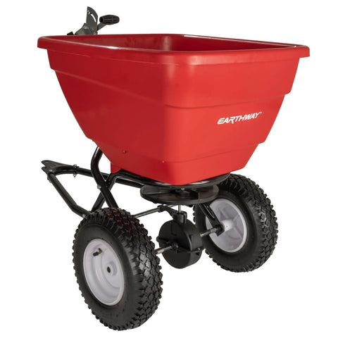 Red tow behind 150lb broadcast spreader for fertilizer and seed with easy flow control adjustable settings, non-skid tires