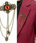 Epic Unisex Steampunk Hair Clip With Spinning Gears And Creepy Devil Eye Brooch For Halloween Costumes Or Gothic Daily Style Antique Gold Metal Alloy Jewelry Accessory attached to a blazer lapel.