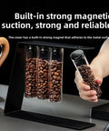 Glass Coffee Bean Storage Tubes Set Of Six With One Way Degassing Valve And Magnetic Stand And Single Dose Espresso Dosing Vials on countertop.