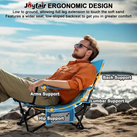 Man reclining on Heavy Duty Folding Beach Chair Set, 2 Pack For Outdoors, showing ergonomic design and support features.