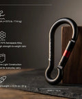 Heavy Duty Carabiner Clip With Spring Snap Wire Gate 3 Inch Aluminum Karabiner next to specs on table