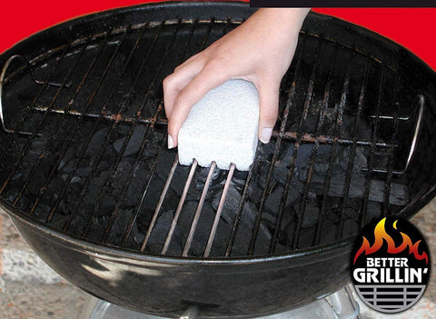Hand using 2 Pack Grill Scrub Stone Barbecue Cleaner Scouring Brick For BBQ Grills And Griddles Fast Clean On Steel And Iron Surfaces