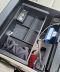 Center Console Organizer Tray For 2014-2018 Silverado 1500 And 2015-2019 Sierra 2500/3500HD showing compartments with items