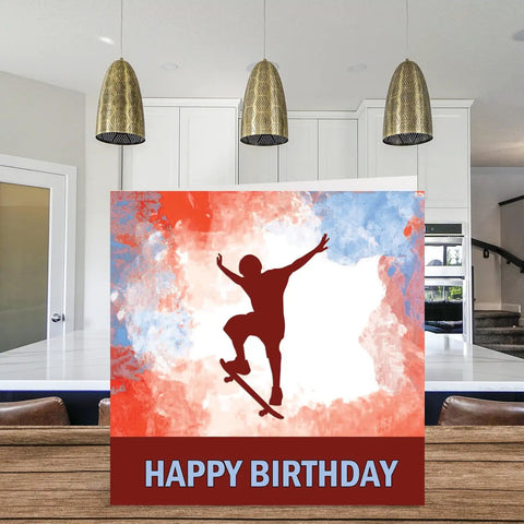 Skateboarding Birthday Card For Boys In Sports Fans Funny Happy Birthday Card For Son Brother Grandson Nephew Uncle Cousin 5.7 Inch greeting card with skateboard design on table.