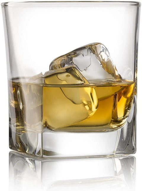 Elegant 10 oz whiskey glass from Whiskey Glass Set With Granite Chilling Stones Set Of 4 10 Oz Old Fashioned Rocks Glasses For Scotch Bourbon And Cocktails Heavy Base Barware Built For Real Talk And Chill Sips, filled with amber liquid and ice.