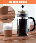 Heavy Duty Silicone Cabinet Door Bumpers, Ultra Grippy Self Adhesive Anticollision Tape, Pro Level Noise Dampening Pads For Kitchen Cabinets And Wood Furniture, Straight Up A Game Changer placed on a cork tray with a cup.