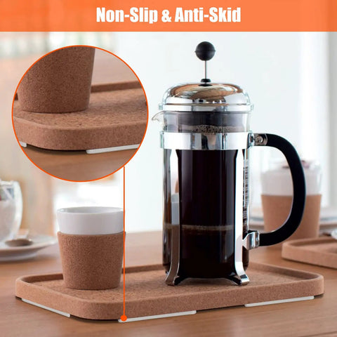 Heavy Duty Silicone Cabinet Door Bumpers, Ultra Grippy Self Adhesive Anticollision Tape, Pro Level Noise Dampening Pads For Kitchen Cabinets And Wood Furniture, Straight Up A Game Changer placed on a cork tray with a cup.