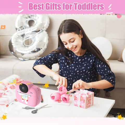 Instant Print Kids Camera For Girls And Grandkids With 1080P HD Video Easy To Use Toy Camera Thermal Printer Includes SD Card Pink Color Perfect Gift For Ages Four Through Ten, pink toy camera on table
