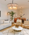 Room with Two-Tier Farmhouse Glass Chandelier With Seeded Glass Shades, Modern Hanging Pendant Light, warm cozy glow style