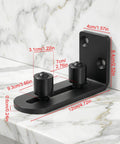 Rock Solid Barn Door Floor Guide 2 Pack With Adjustable Stay Rollers installed, showing black flat bottom flush mount on marble.