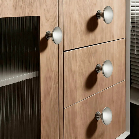 Close-up of cabinet with Five Pack Round Cabinet Knobs With Brushed Nickel Finish, Single Hole Drawer Pulls