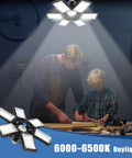 Super Bright 180W Garage Light Bulbs illuminating a workshop with 6 plus 1 deformable panel design for 360 degree illumination.