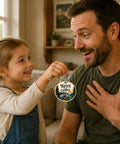 Child giving Happy Camper Keychain For RV Lovers And Road Trip Fans to man, features 'Keys to the Camper' engraving.
