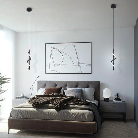 13W Modern Spiral LED Pendant Light Fixture 5500K Cold White Integrated LED Sleek Black Finish hanging in a bedroom.