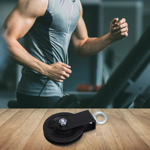 Hard Nylon 88Mm Cable Pulley Wheel For Gym Pulley Systems With Smooth Bearings alongside a person running on a treadmill