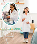 Girl wearing a medium Six Piece Kids Doctor Coat Costume Set; white polyester lab coat for pediatric dress up