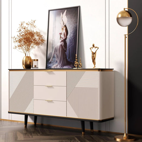 Modern dresser with artistic decor and gold accents in a stylish living room setting