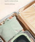 No Drama Portable Washing Machine 20L Capacity in a suitcase, showcasing its foldable design, ready for travel.