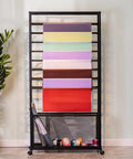 Heavy Duty Steel Mobile Cart And Fabric Roll Storage Rack For Textile Wallpaper Organizing With 200Kg Capacity And Slick Lockable Casters showing stacked colorful paper rolls.