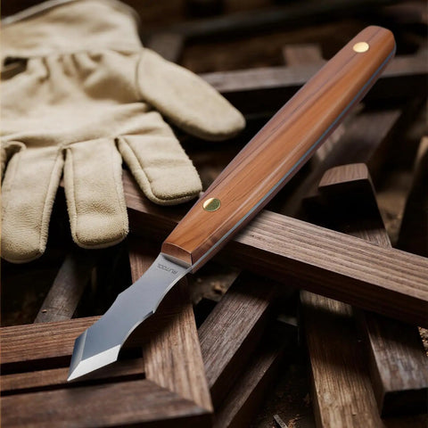 Heavy Duty Long Neck Marking Knife For Woodworking features a steel blade, wooden handle, and leather glove on wood background.