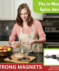 Woman using Magnetic Stainless Steel Measuring Spoons Set 8 Pieces With Leveler in kitchen, baking cookies with ingredients.