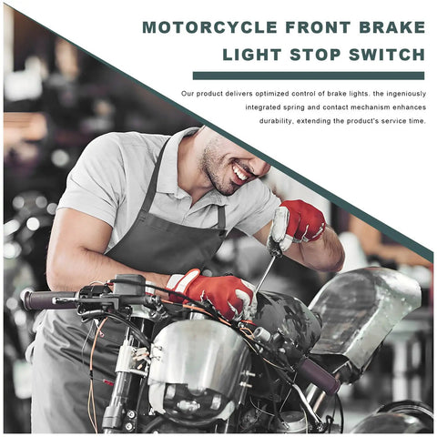 Mechanic installing a right hand brake light switch on a motorcycle front hydraulic master cylinder in a workshop