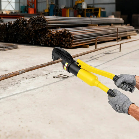 Heavy Duty 22mm Hydraulic Rebar Cutter With Sturdy Steel Toolbox For Construction Sites, cutting through steel bar at a worksite.