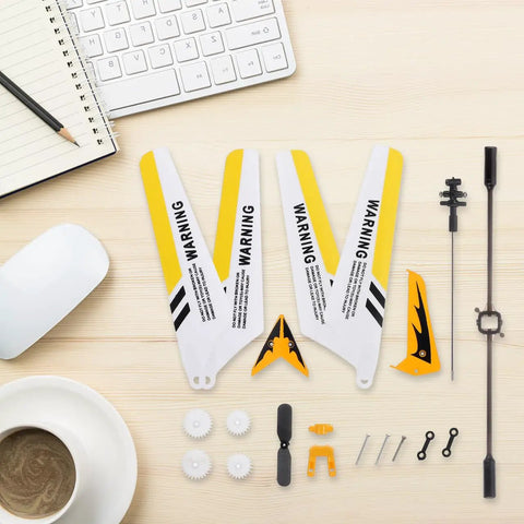 Ultimate Spare Parts Kit for S107 and S107G RC Helicopters in Yellow ABS Plastic and Alloy displayed with main and tail blades.