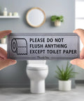 Two Pack Do Not Flush Anything Except Toilet Paper Sign held in hands near bathroom toilet; waterproof PVC sign in restroom setting.