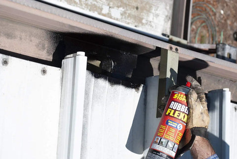 Applying Rubber Flexx Waterproof Repair Sealant Spray Point And Spray To Seal Cracks Holes Leaks Corrosion And More Black 18oz on metal